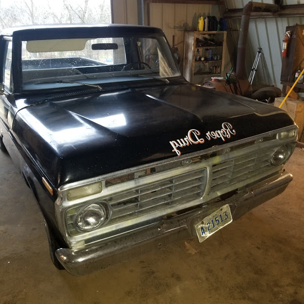The Ford F-100 Project Truck, front view, sitting in the shop.